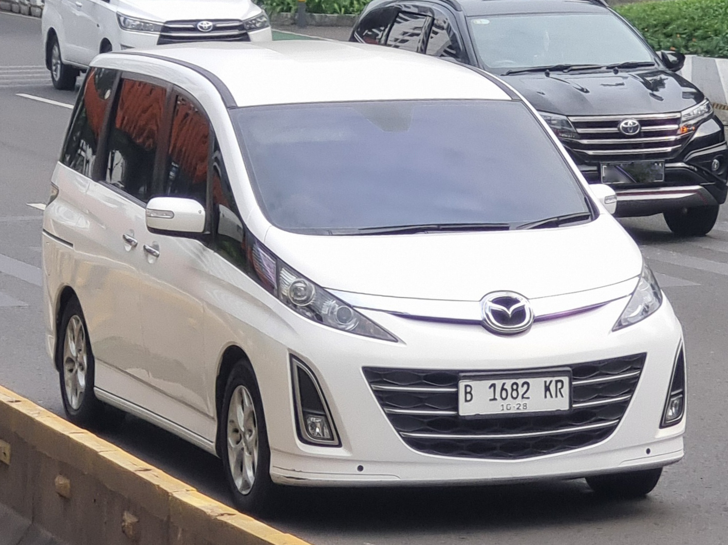 B 1682 KR, Mazda Biante 1st gen (CC), 2008–2018