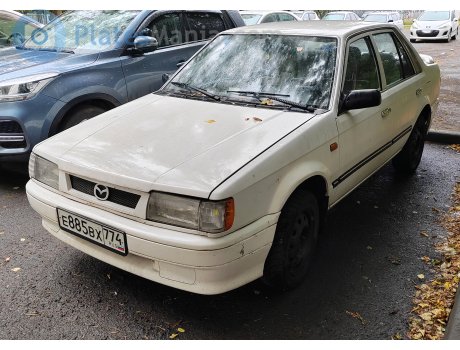 е885вх774, Mazda 323