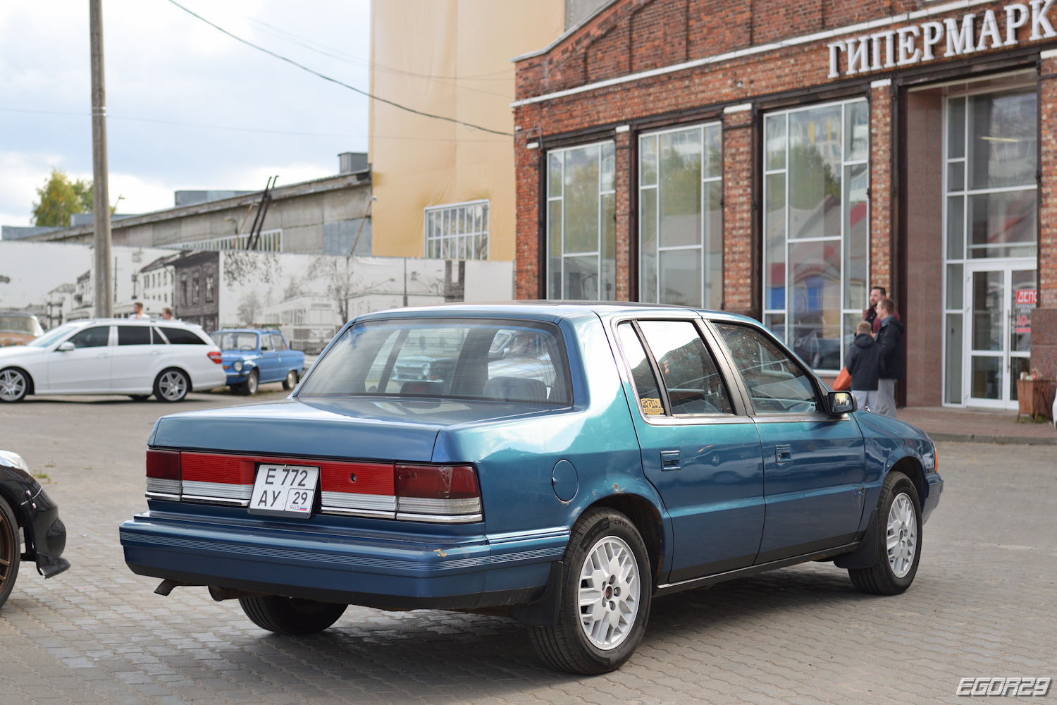 е 772 ау 29, Plymouth Acclaim 1st gen (AA-body), 1989–1994