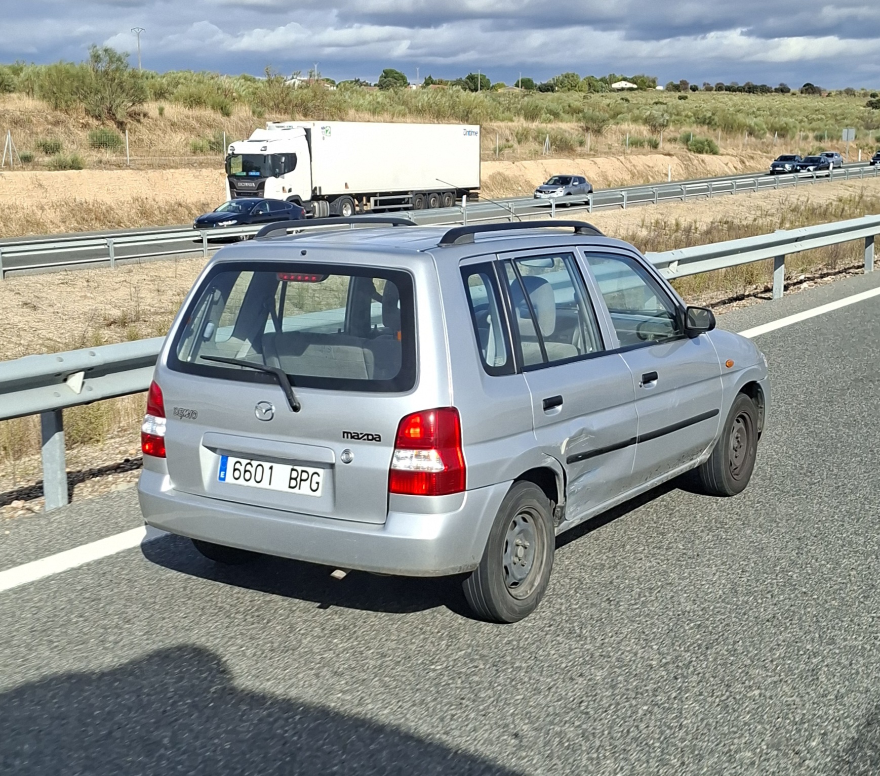 6601 BPG, Mazda Demio 1st gen (DW), 1996–2003