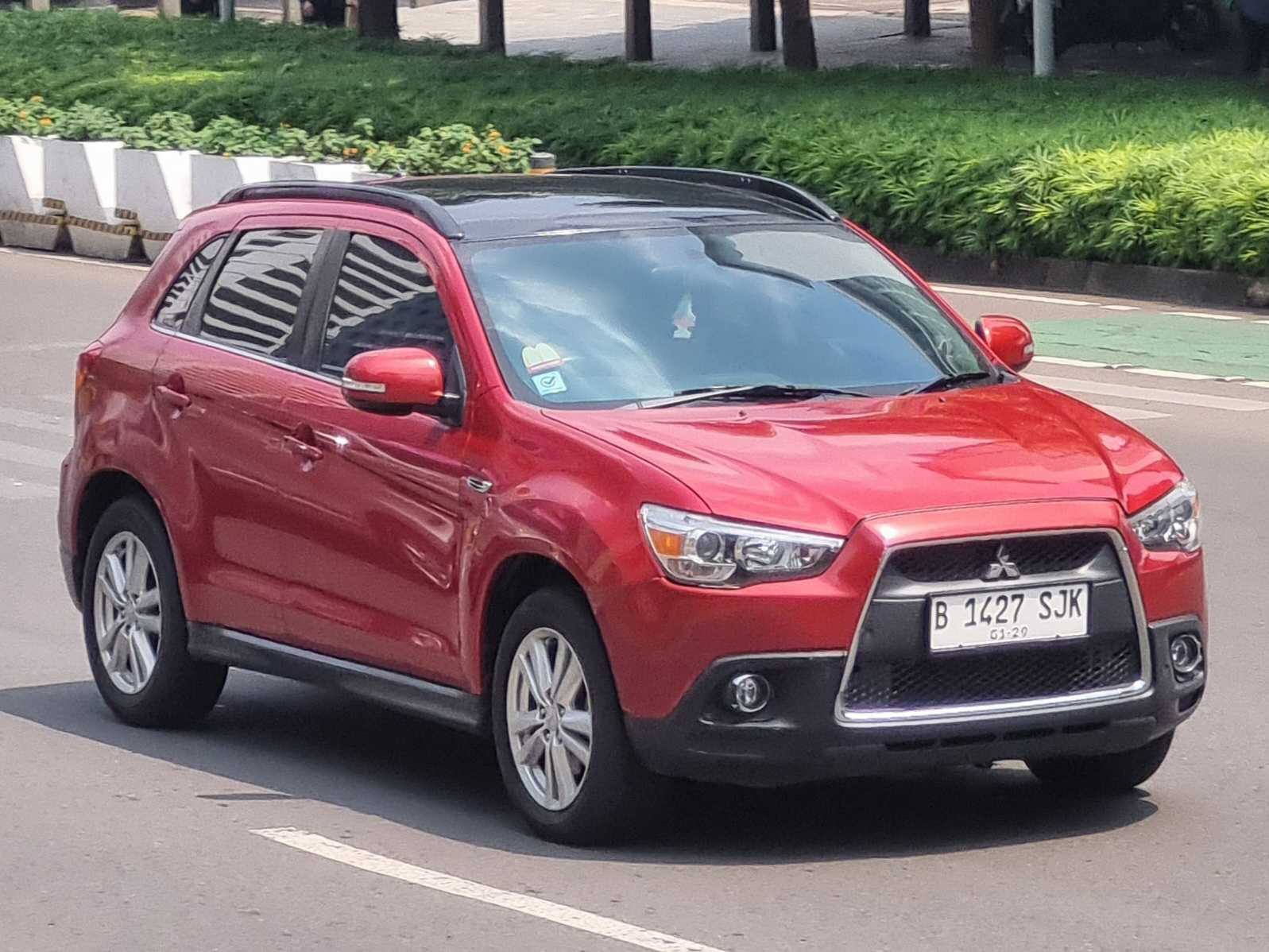 B 1427 SJK, Mitsubishi Outlander Sport 1st gen (GA/XA/XB/XC/XD), 2010–2019