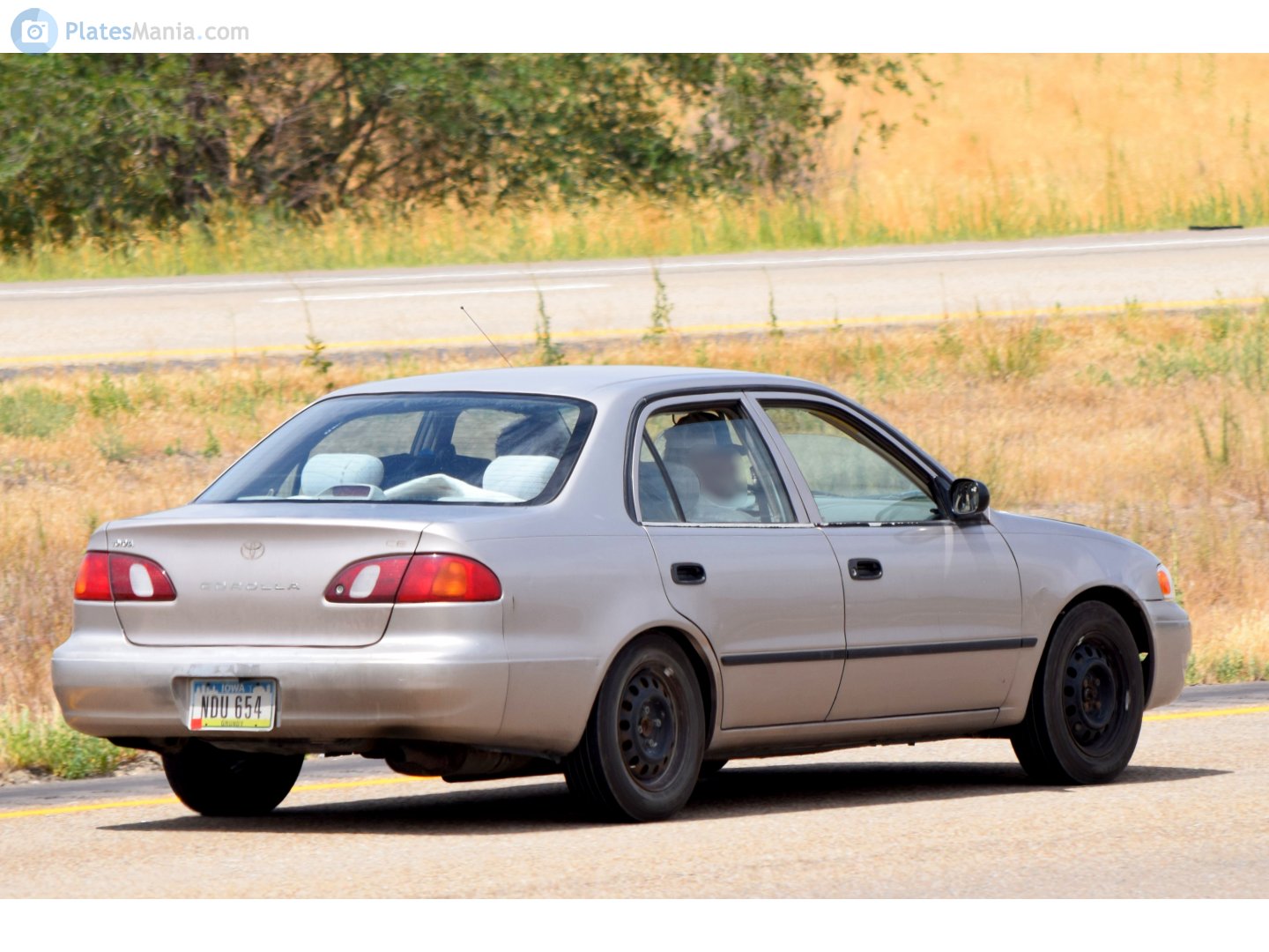 NDU 654, Toyota Corolla 8th gen Sedan (E110; NA-market), 1997–2001
