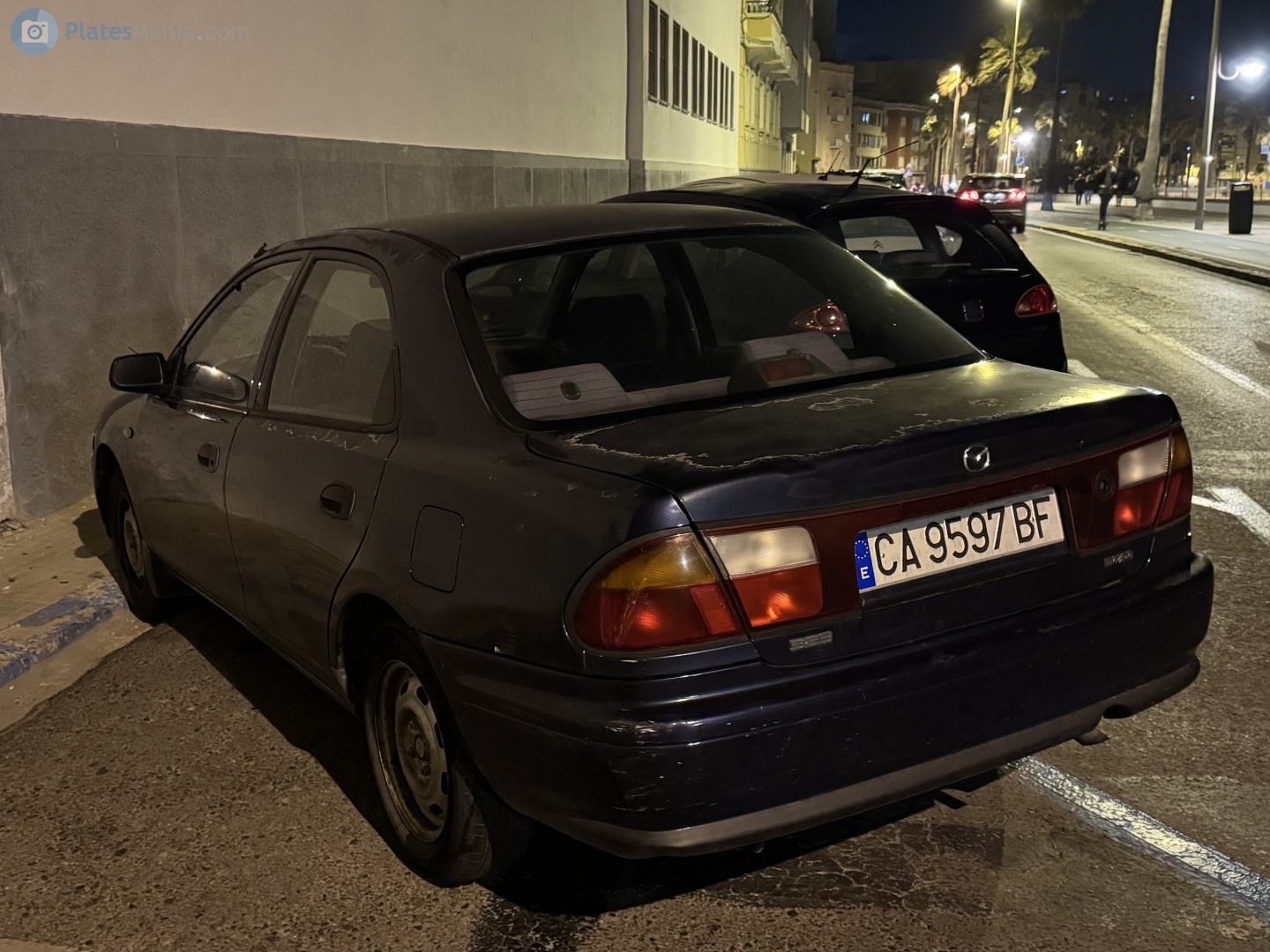 CA 9597 BF, Mazda 323 5th gen S (Protégé/Lantis/Familia) Sedan (BA), 1994–1998