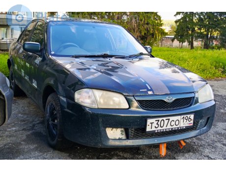 т307со196, Mazda Familia