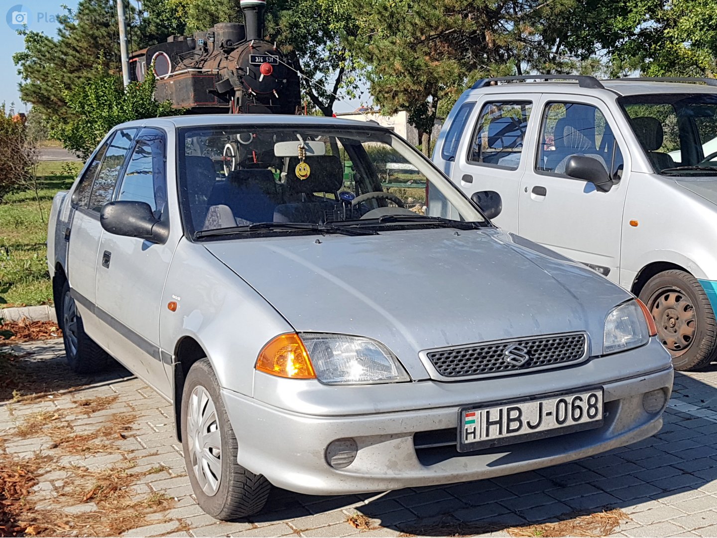 HBJ-068, Suzuki Swift 2nd gen Sedan (SF), facelift, 1996–2004