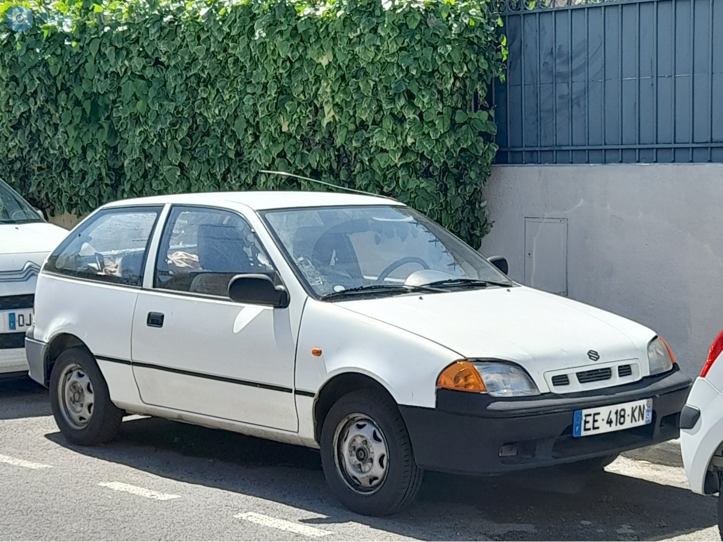 EE-418-KN, Suzuki Swift 2nd gen 3-door Hatch (SF), facelift, 1996–2004