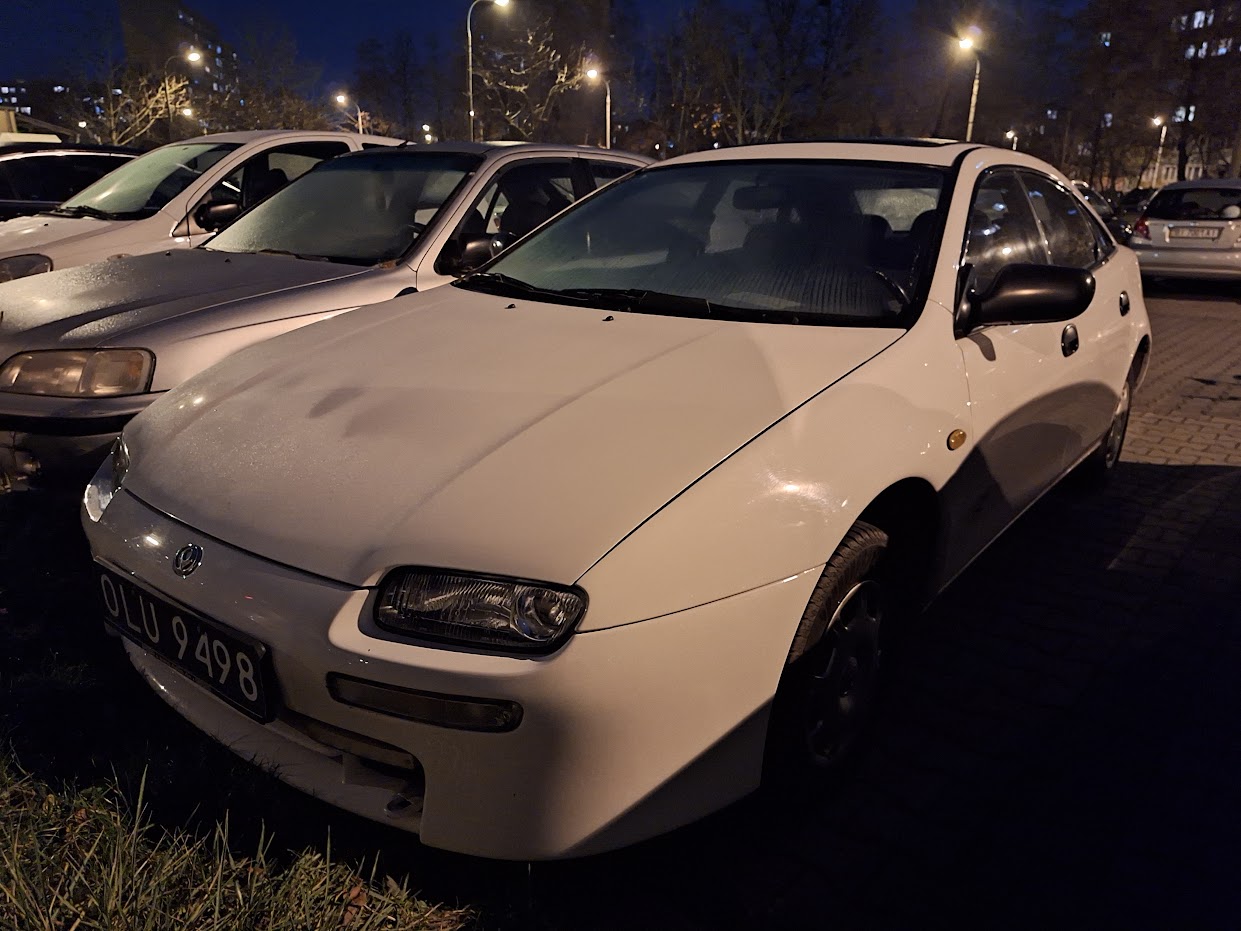 OLU 9498, Mazda 323 5th gen F (Astina) 5-door Hatch (BA), 1994–1998