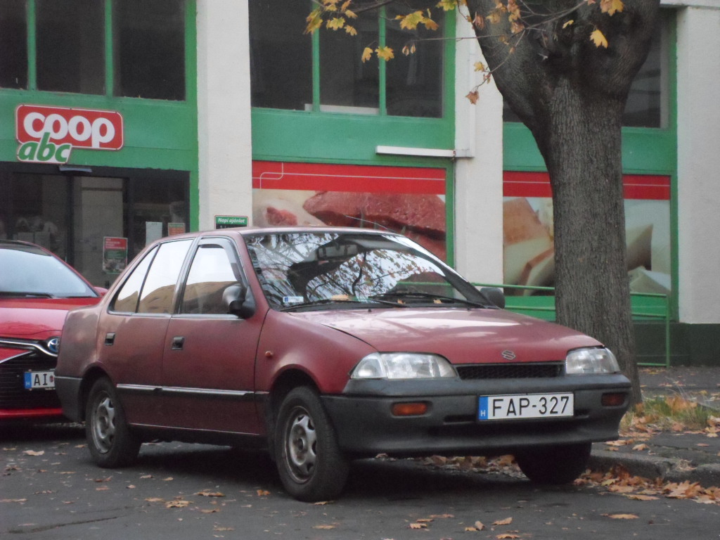 FAP-327, Suzuki Swift 2nd gen Sedan (SF), facelift, 1996–2004