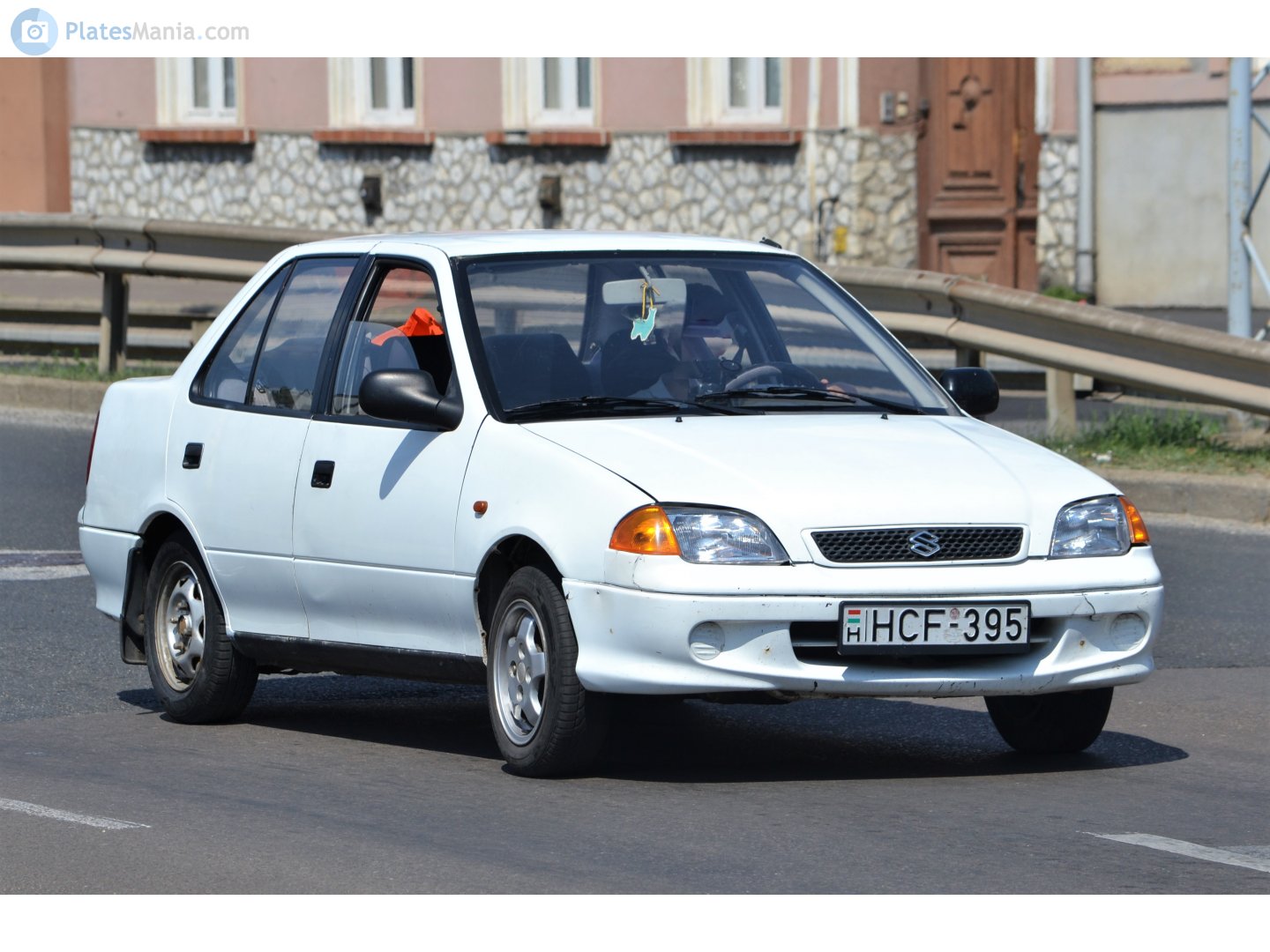 HCF-395, Suzuki Swift 2nd gen Sedan (SF), facelift, 1996–2004