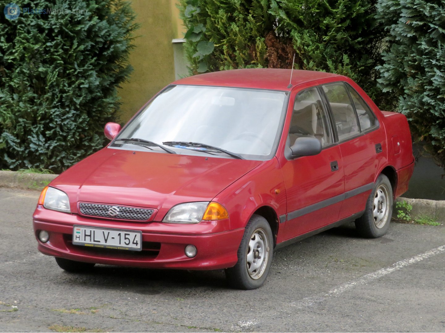 HLV-154, Suzuki Swift 2nd gen Sedan (SF), facelift, 1996–2004