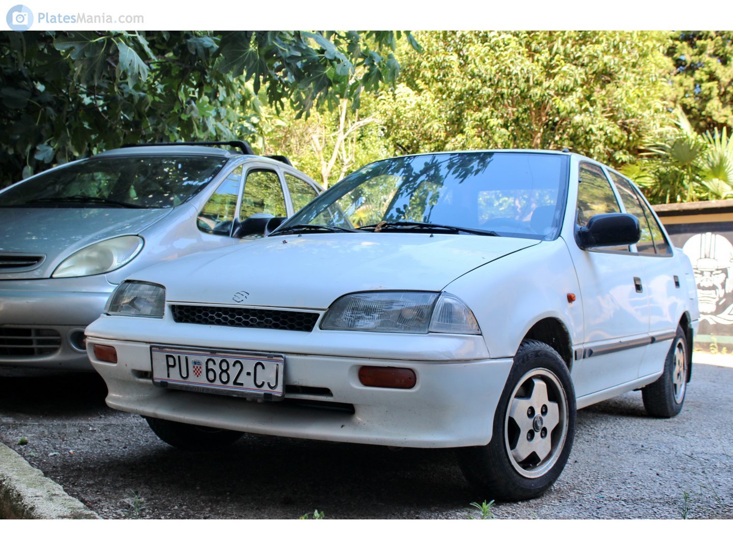 PU 682-CJ, Suzuki Swift 2nd gen Sedan (SF), 1990–1996