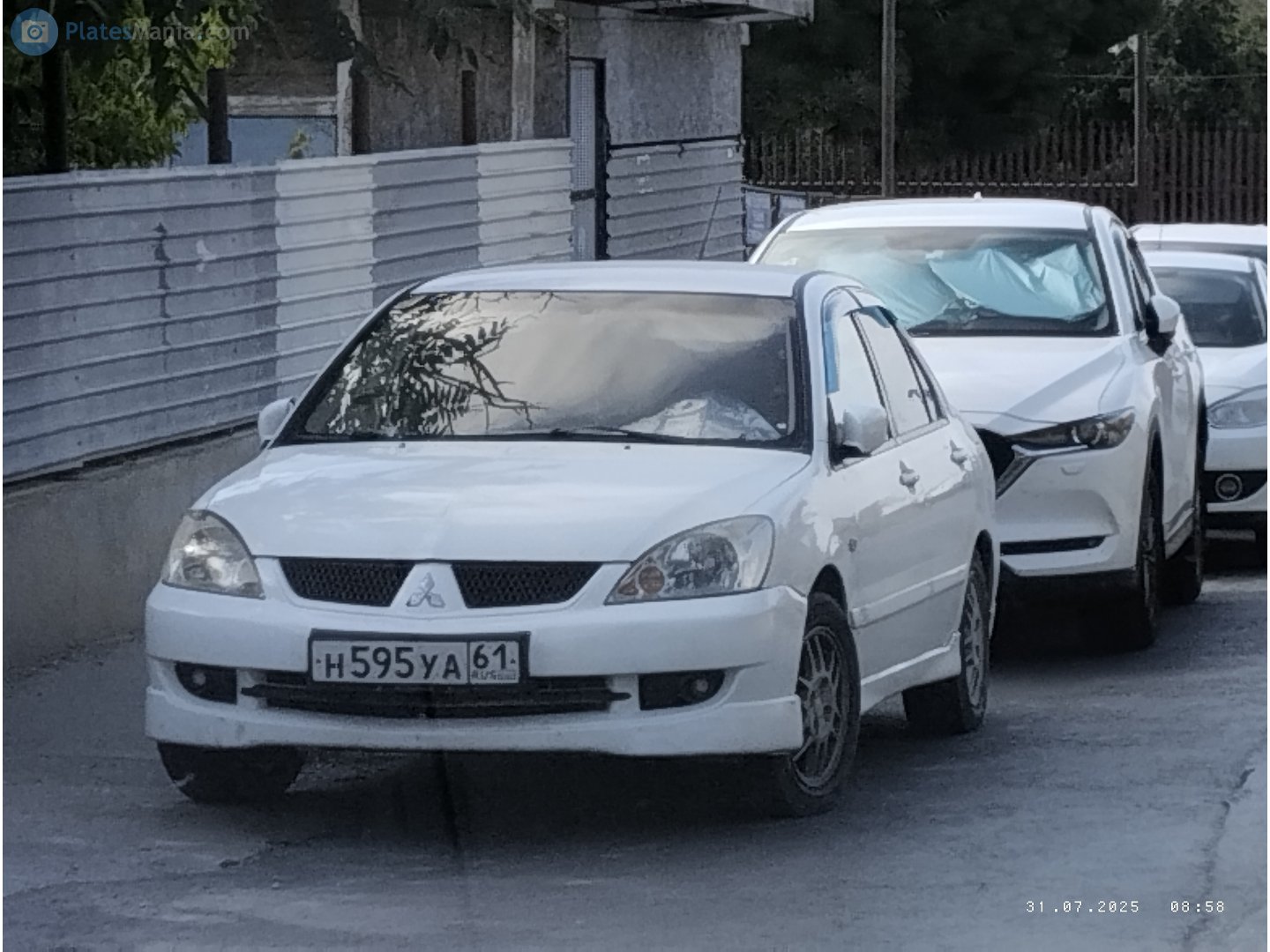 н 595 уа 61, Mitsubishi Lancer 