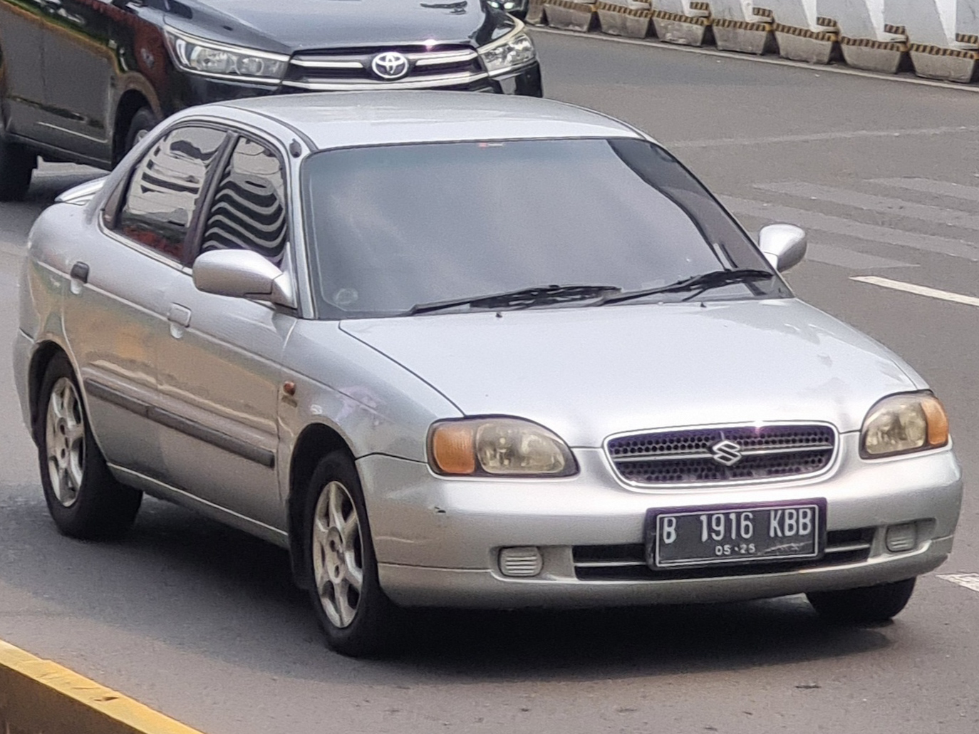 B 1916 KBB, Suzuki Baleno 1st gen Sedan (EG), 1995–2002