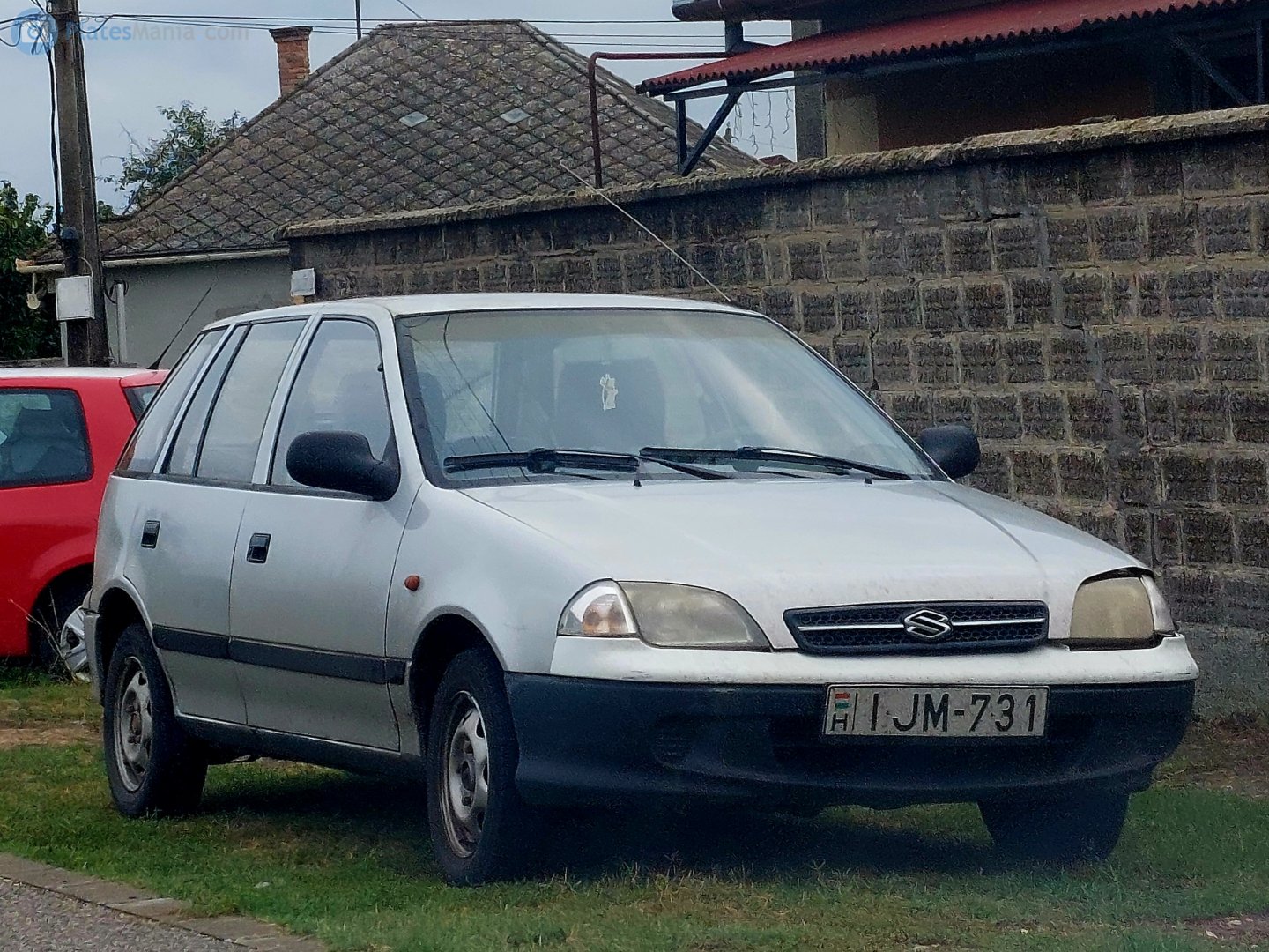 IJM-731, Suzuki Swift 2nd gen 5-door Hatch (SF), facelift, 1996–2004