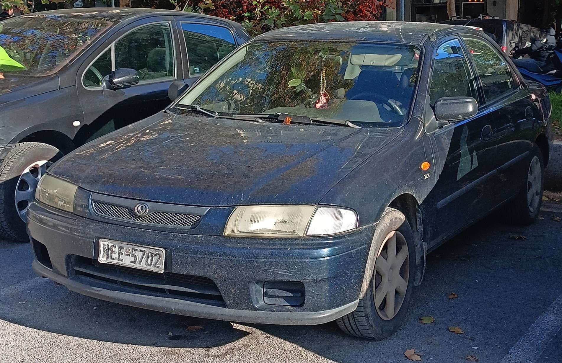 NEE-5702, Mazda 323 5th gen S (Protégé/Lantis/Familia) Sedan (BA), 1994–1998