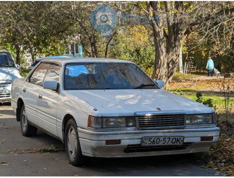 16 560-57 OK, Mazda Luce