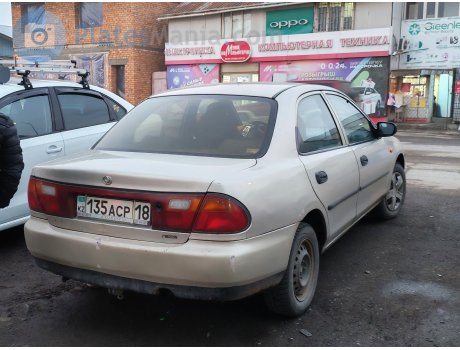 135 ACP 18, Mazda 323