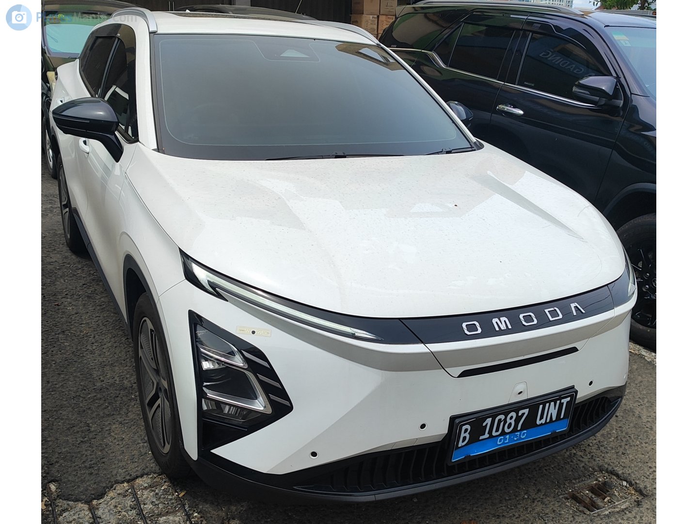 B 1087 UNT, Omoda C5 1st gen EV, 2023–