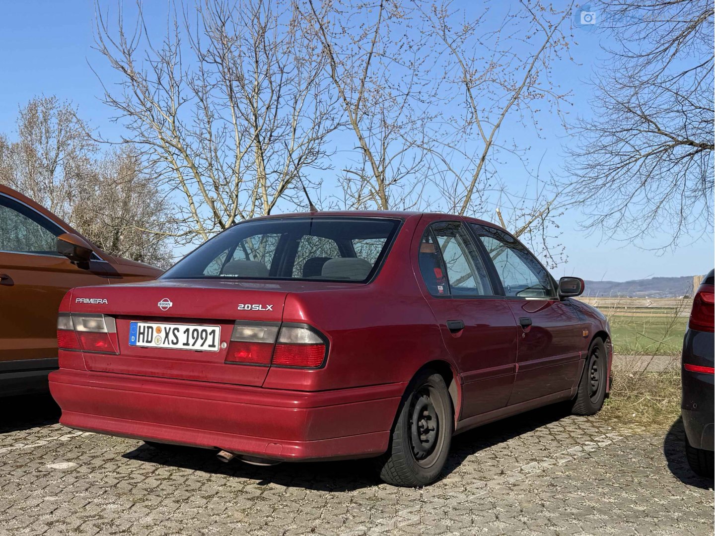 HD XS 1991, Nissan Primera 1st gen Sedan/Liftback (P10), 1990–1996