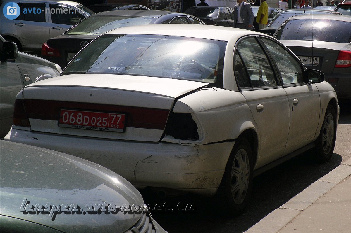 068 D 025 77, Saturn S-Series 2nd gen, Sedan (SL), 1995–1999