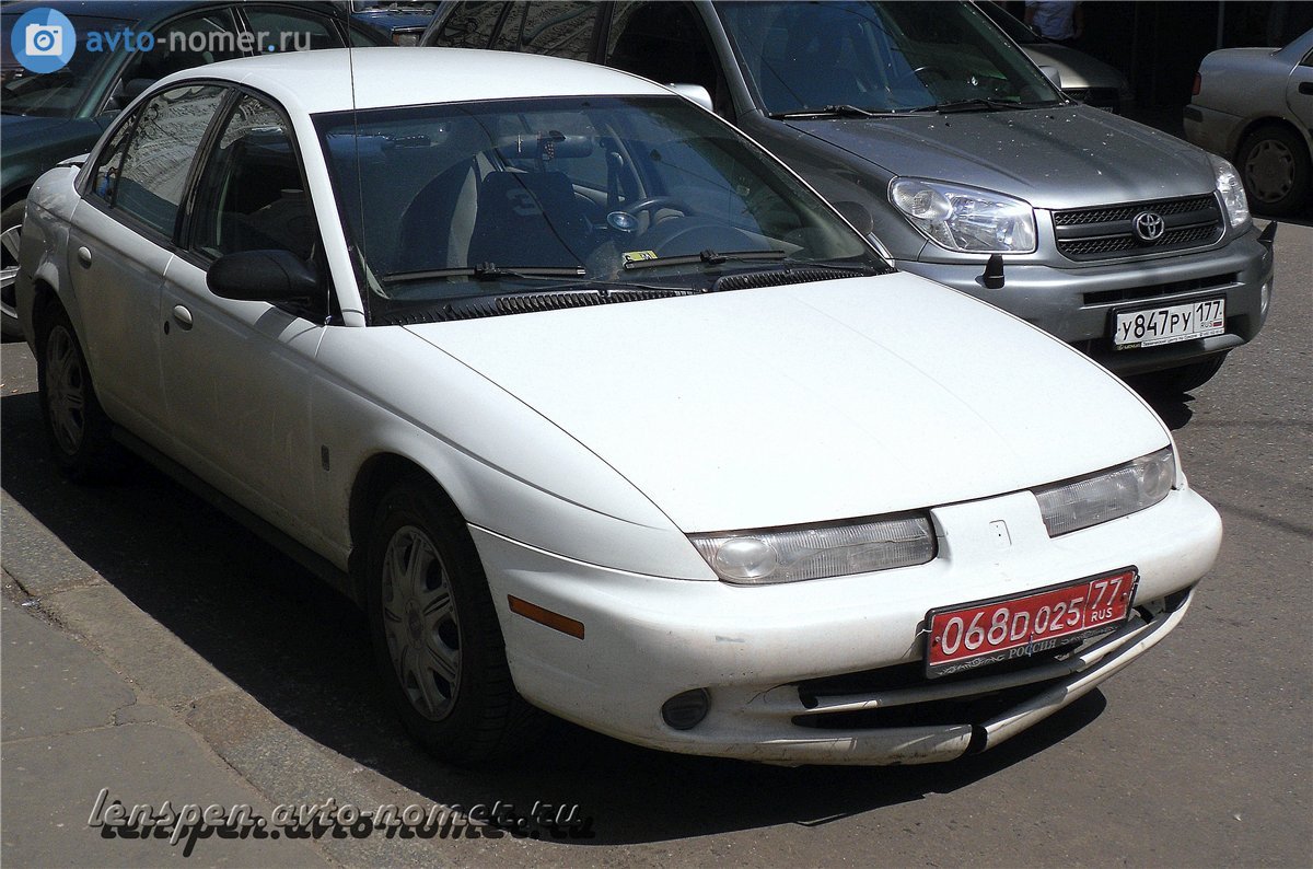 068 D 025 77, Saturn S-Series 2nd gen, Sedan (SL), 1995–1999